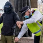 police officer searching an individual