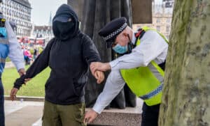 police officer searching an individual