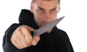 threatening man knife